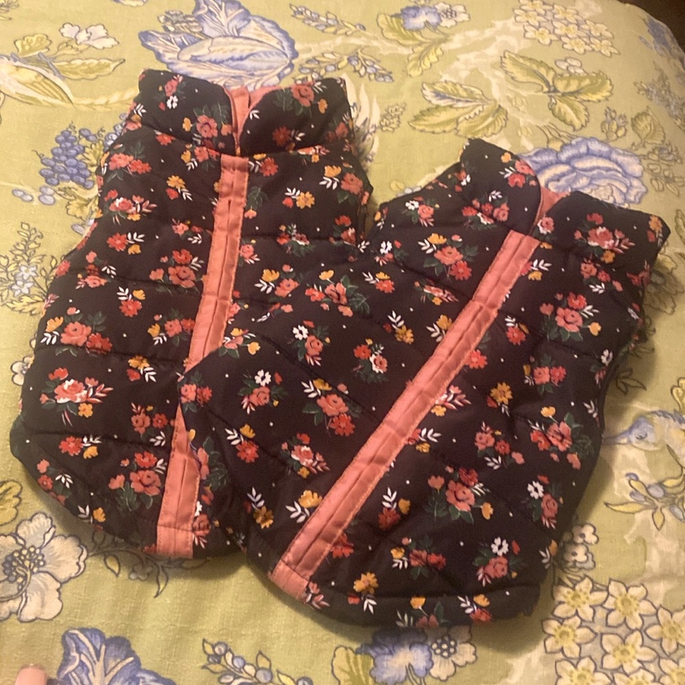 Two, quilted floral puffer vests for your fur babies